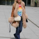 Laura Whitmore in a Rainbow Top Heads Out of the BBC Studios in London