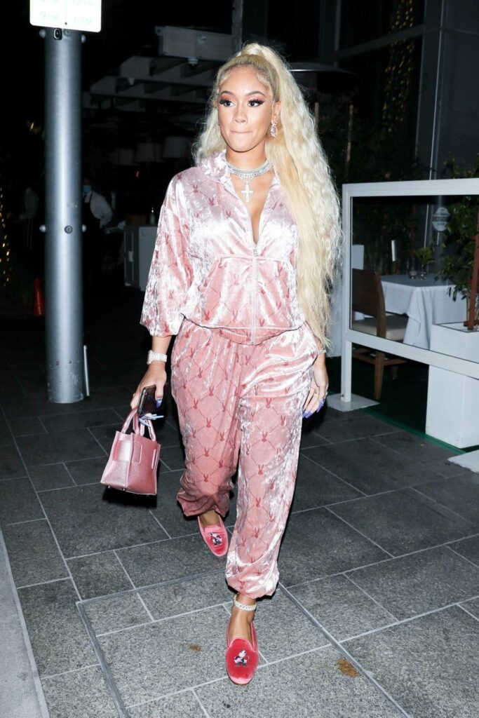 Saweetie in a Pretty Pink Sweatsuit Leaves a Solo Dinner at AVRA in ...