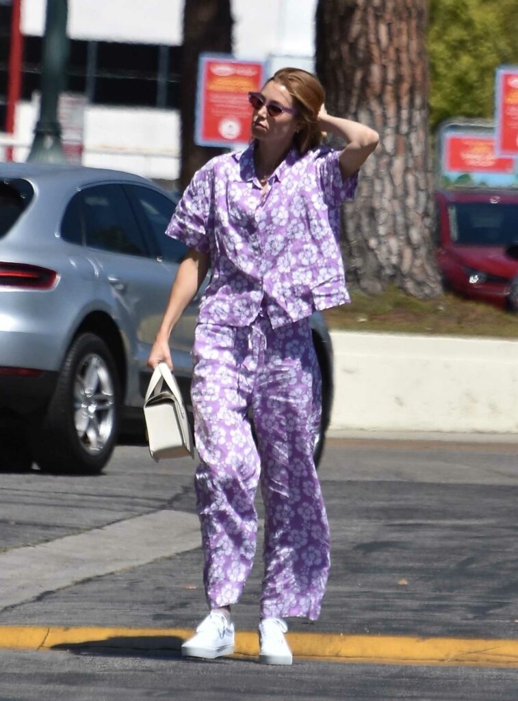 Whitney Port in a Purple Floral Print Outfit