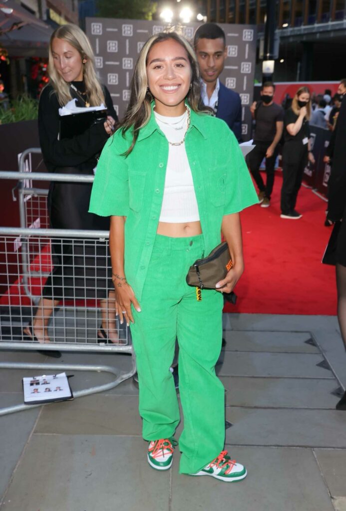 Chelcee Grimes in a Neon Green Suit