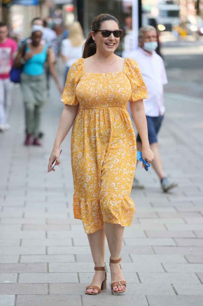 Kelly Brook in a Yellow Summer Dress