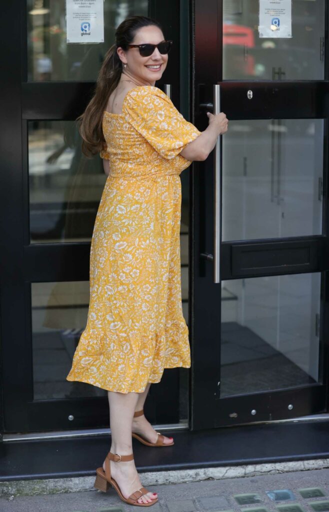 Kelly Brook in a Yellow Summer Dress