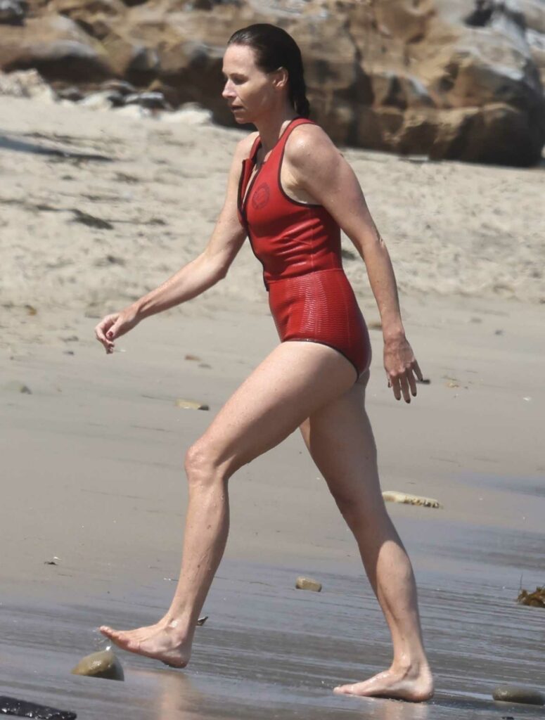 Minnie Driver in a Red Swimsuit