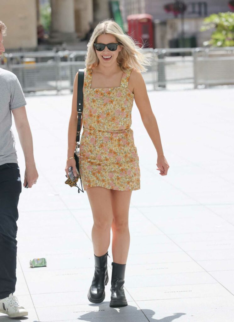 Mollie King in a Floral Mini Dress