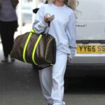 Molly-Mae Hague in a White Sweatshirt Leaves a Hair Salon in Wilmslow