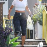 Nicole Murphy in a White Cropped Tee Was Seen Out in Los Angeles