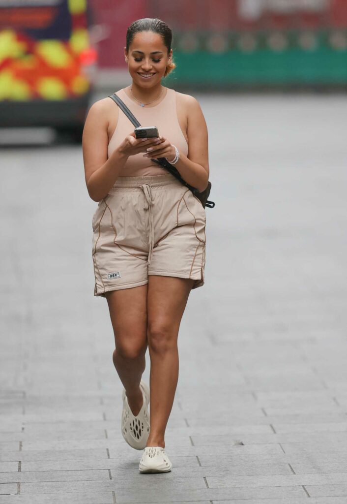 Amber Gill in a Beige Outfit