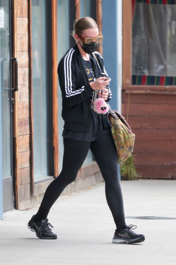 Ashlee Simpson in a Black Adidas Track Jacket
