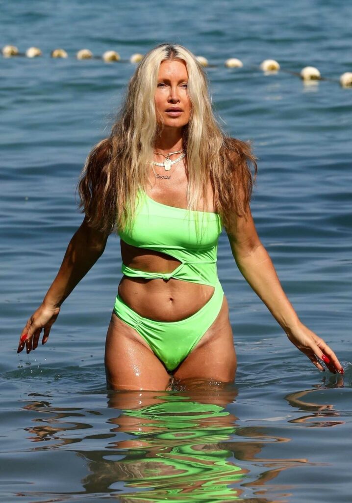 Caprice Bourret in a Green Bikini