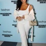 Jordyn Woods Attends Boohoo x Madison Beer Launch Event at Pendry West Hollywood in Los Angeles