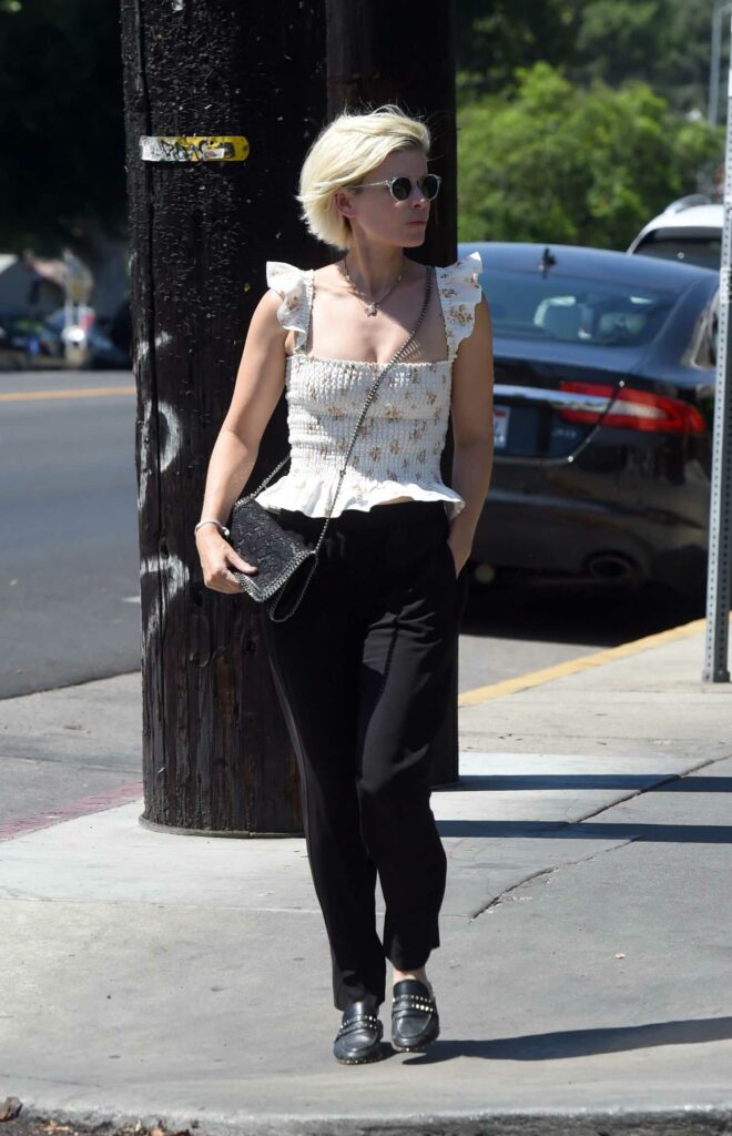 Kate Mara in a White Floral Blouse