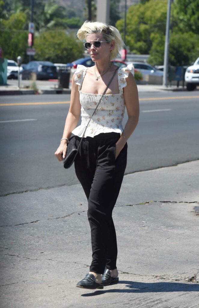 Kate Mara in a White Floral Blouse