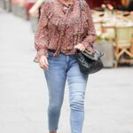 Kelly Brook in a Floral Blouse Arrives at the Heart Radio in London