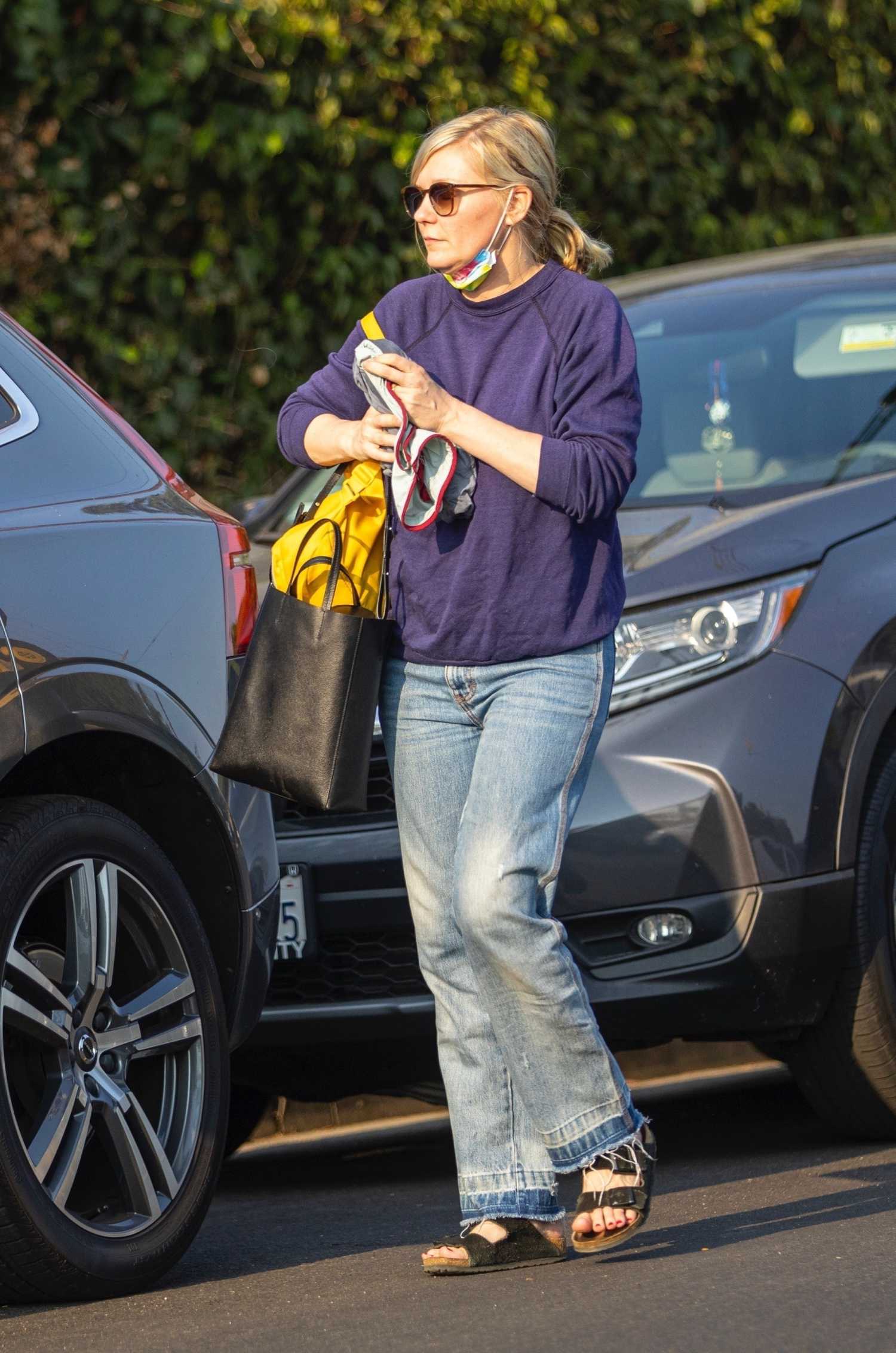 Kirsten Dunst in a Purple Sweatshirt Was Seen Out in Los Angeles ...