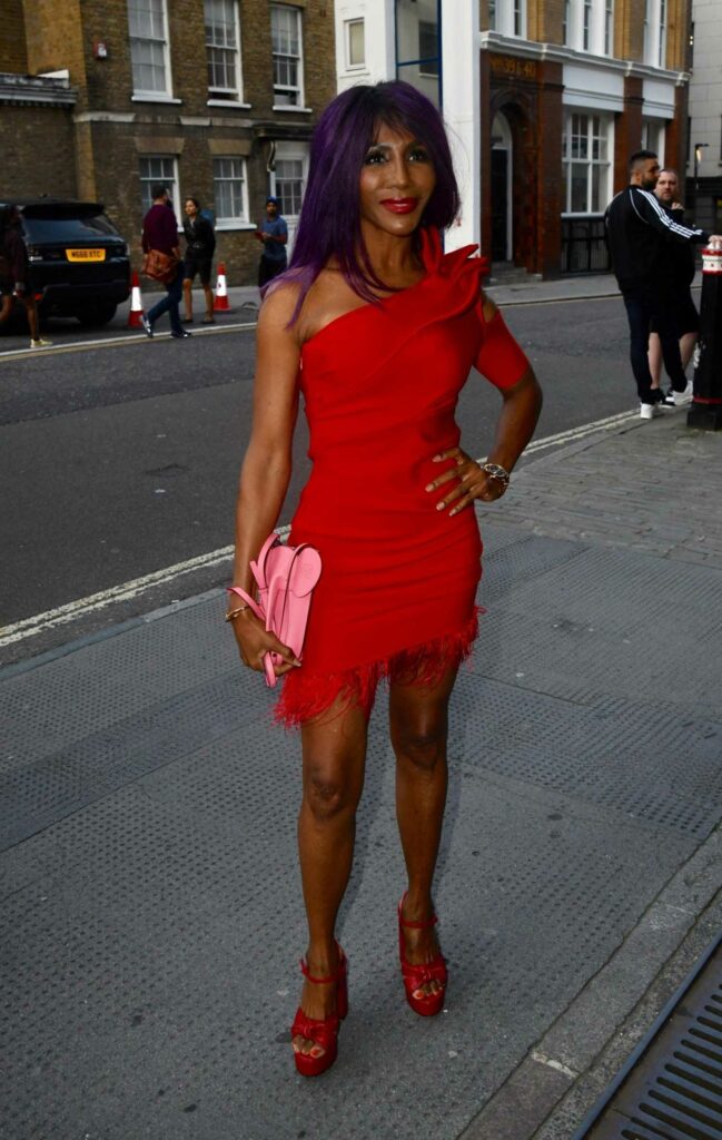 Sinitta in a Red Dress