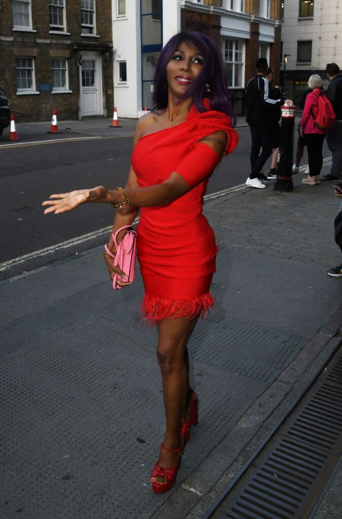 Sinitta in a Red Dress