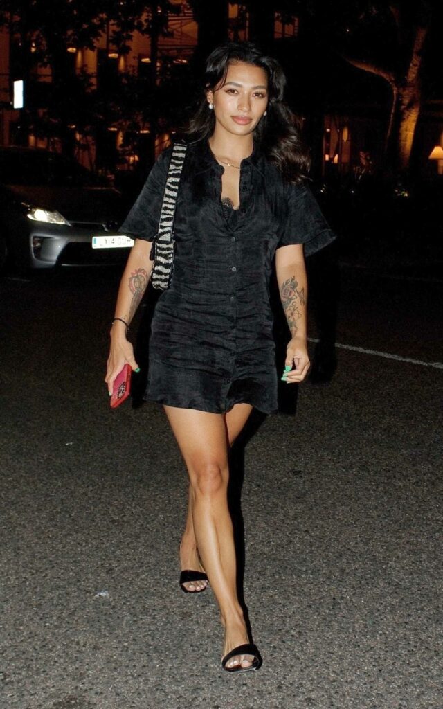 Vanessa White in a Black Mini Dress