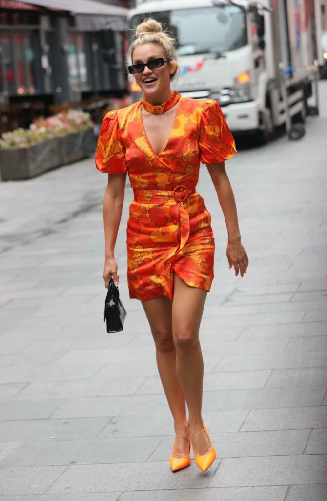 Ashley Roberts in an Orange Mini Dress