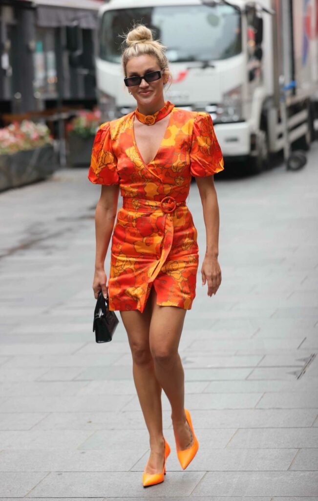 Ashley Roberts in an Orange Mini Dress