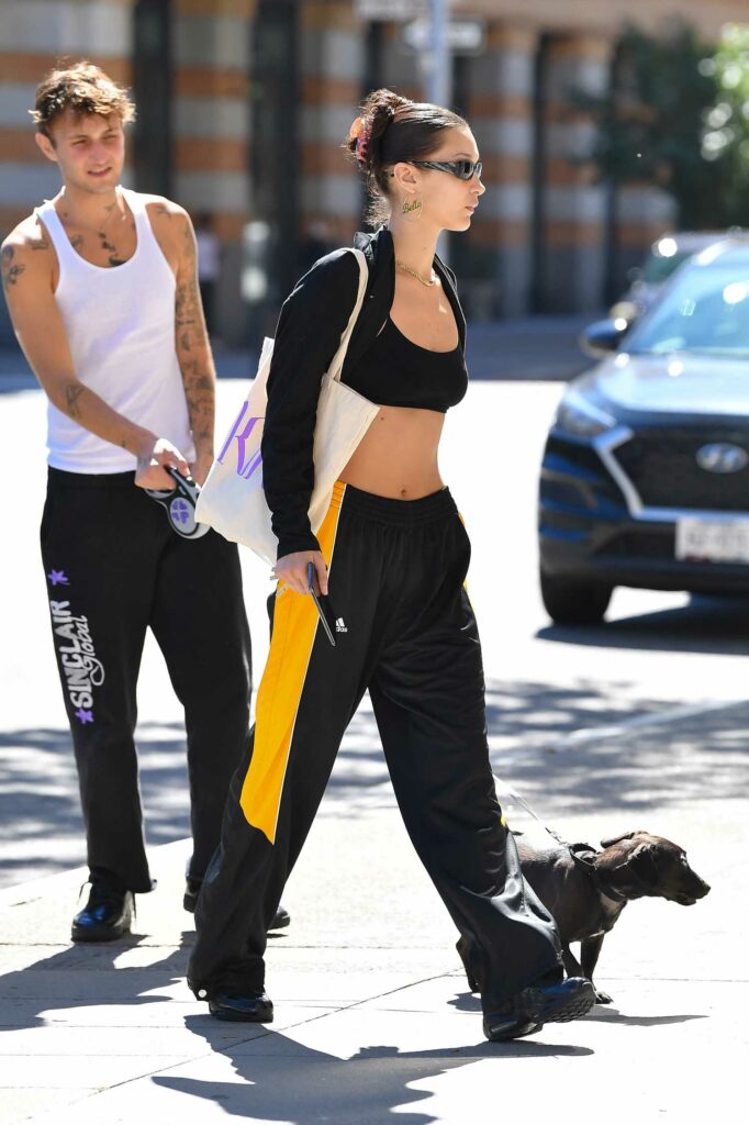 Bella Hadid in a Black and Yellow Adidas Tracksuit