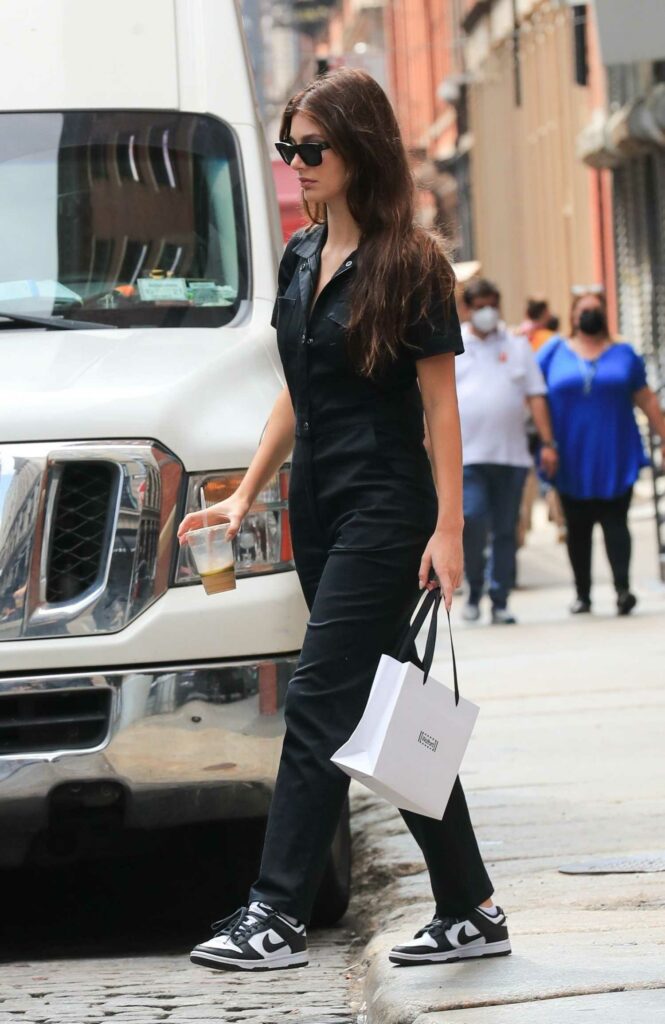 Camila Morrone in a Black Jumpsuit
