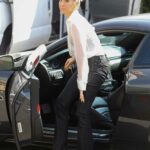 Heather Rae Young in a White Shirt Was Seen with Her Dog Out in West Hollywood