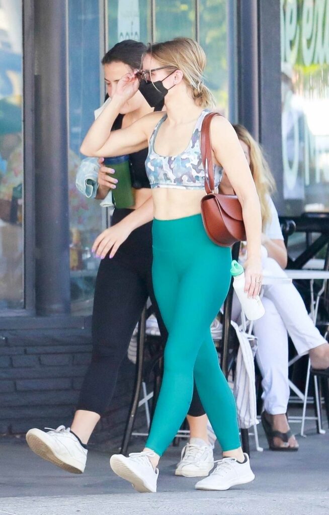 Kristen Bell in a Green Leggings