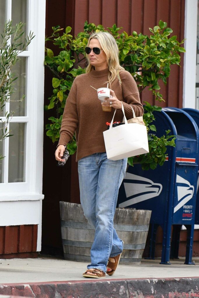 Molly Sims in a Tan Sweater