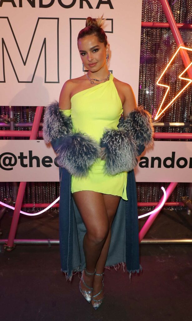 Addison Rae in a Neon Green Mini Dress