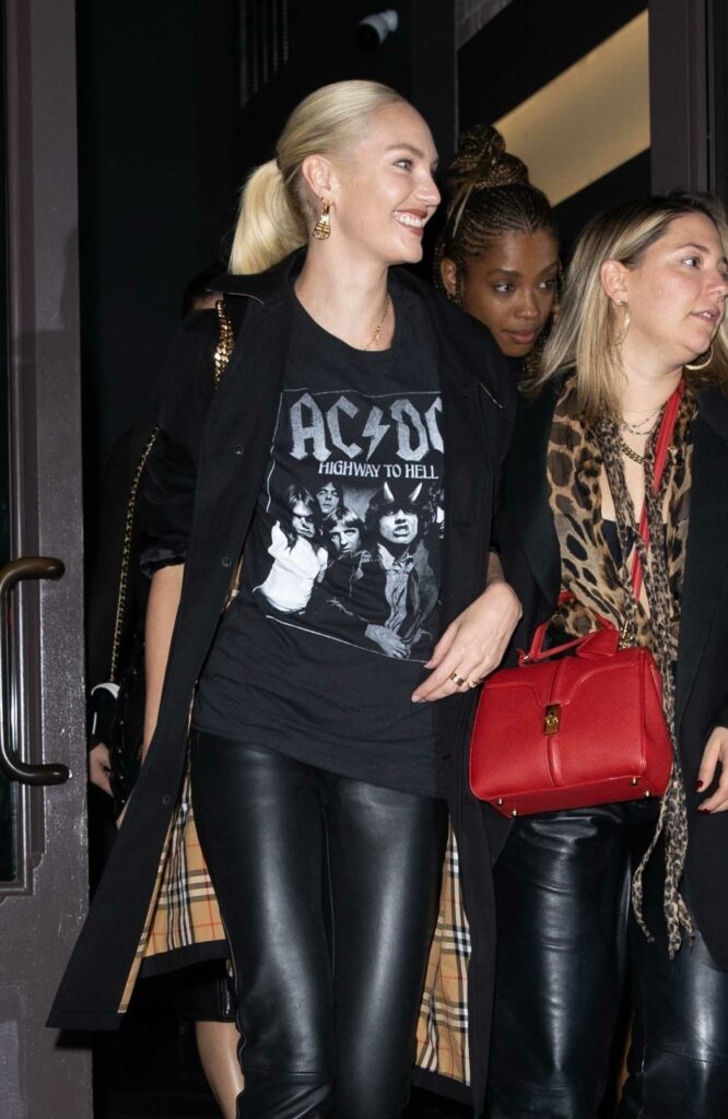 Candice Swanepoel in a Black ACDC Tee