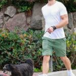 Chace Crawford in a Green Shorts Walks His Dog in Los Feliz