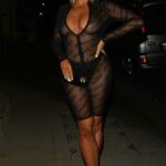 Eve Gale in a Black See-Through Dress Heads for a Night Out at Tape Nightclub in London