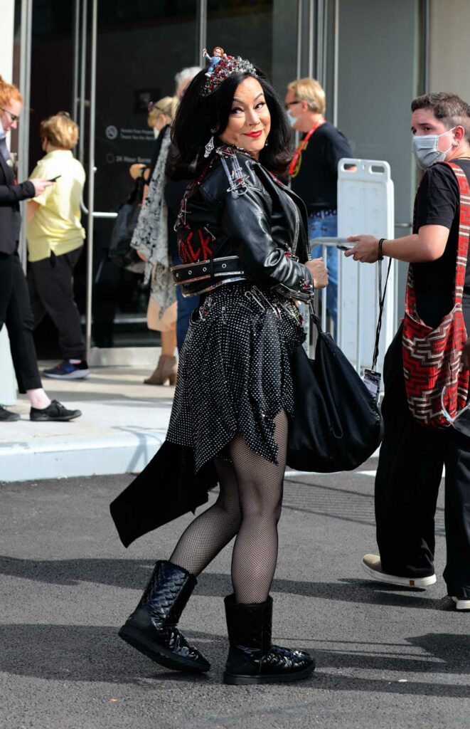 Jennifer Tilly in a Black Leather Jacket