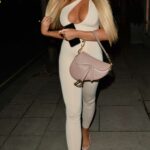 Jess Gale in a Beige Catsuit Arrives at MKNY House in Mayfair in London