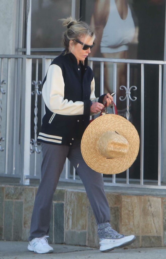 Kim Basinger in a Grey Track Pants
