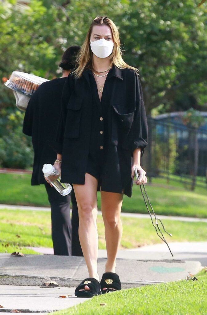 Margot Robbie in a Black Jacket