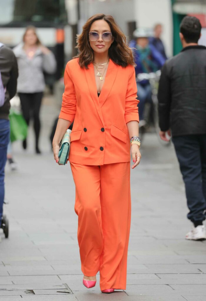 Myleene Klass in an Orange Pantsuit