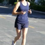 Natalie Morales in a White Sneakers Takes a Jog Around the Neighborhood in Los Angeles