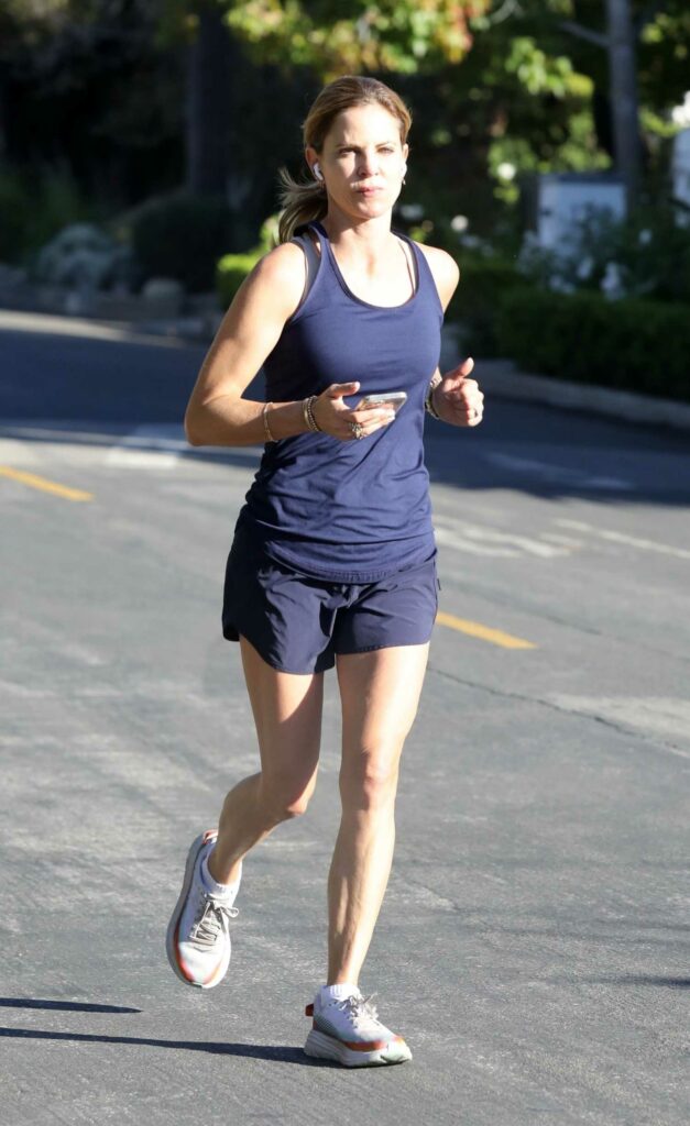 Natalie Morales in a White Sneakers