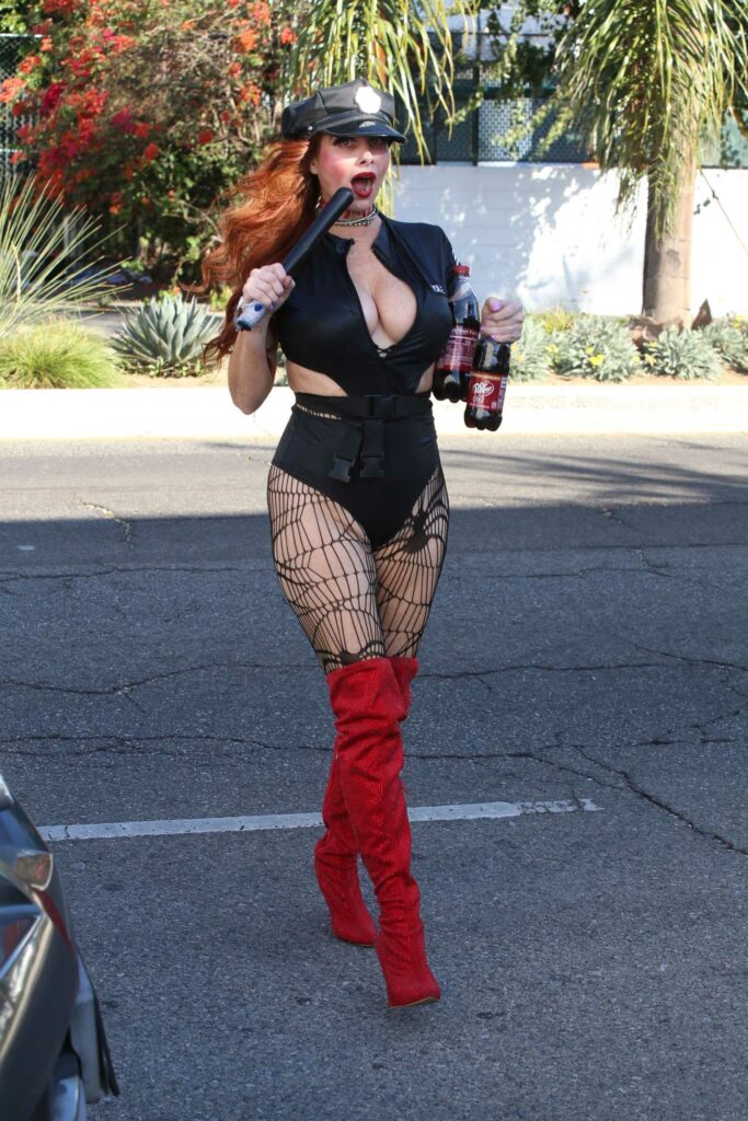 Phoebe Price in a Halloween Police Costume