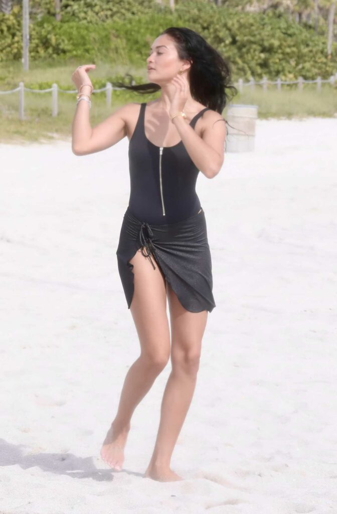 Shanina Shaik in a Black Swimsuit