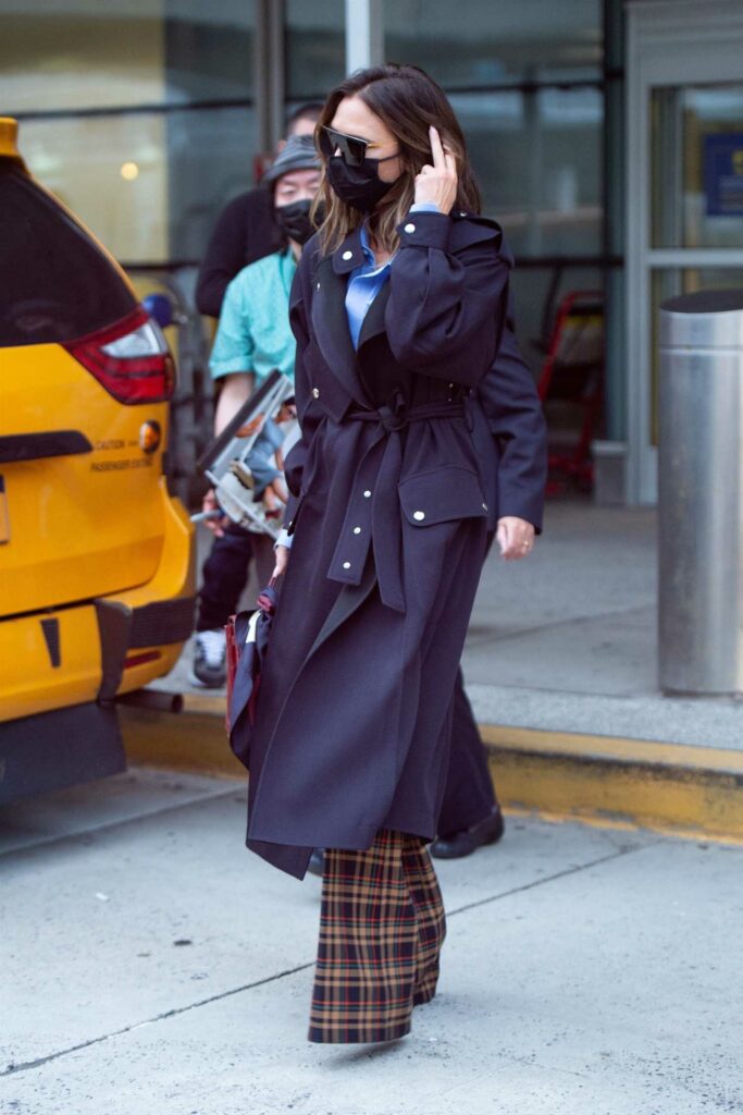 Victoria Beckham in a Black Coat