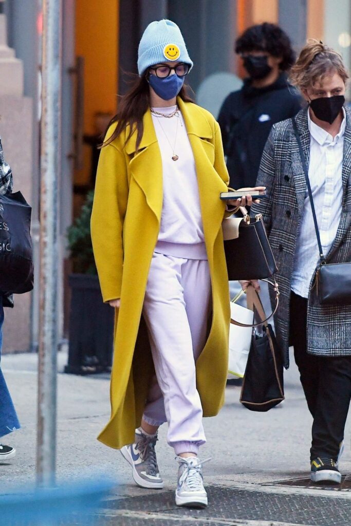 Anne Hathaway in a Yellow Trench Coat