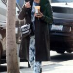 Ashley Benson in a Black Leather Coat Does a Coffee Run in Los Angeles