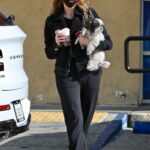 Ashley Benson in a Black Leather Jacket Brings Her Pup for a Coffee Run in Los Angeles