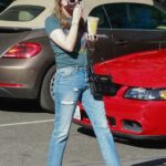 Ashley Benson in a Blue Ripped Jeans Stops by Starbucks in Los Feliz