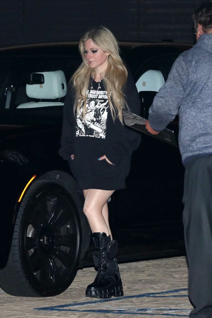 Avril Lavigne in a Black Hoodie