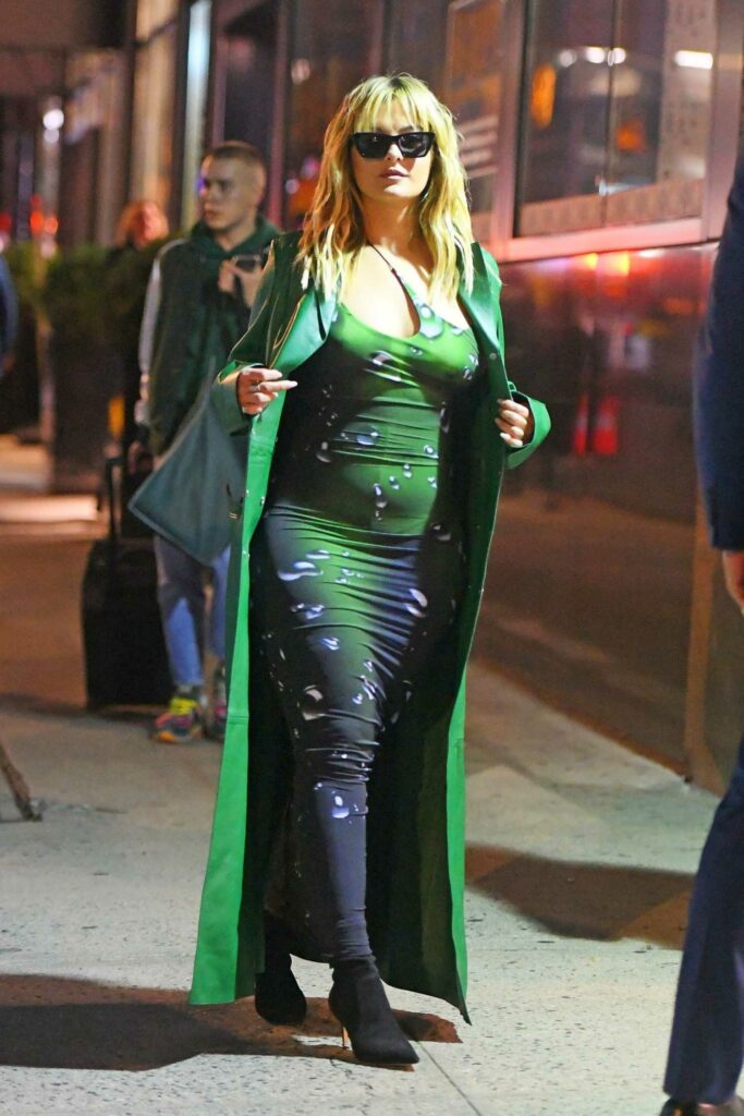Bebe Rexha in a Green Leather Coat