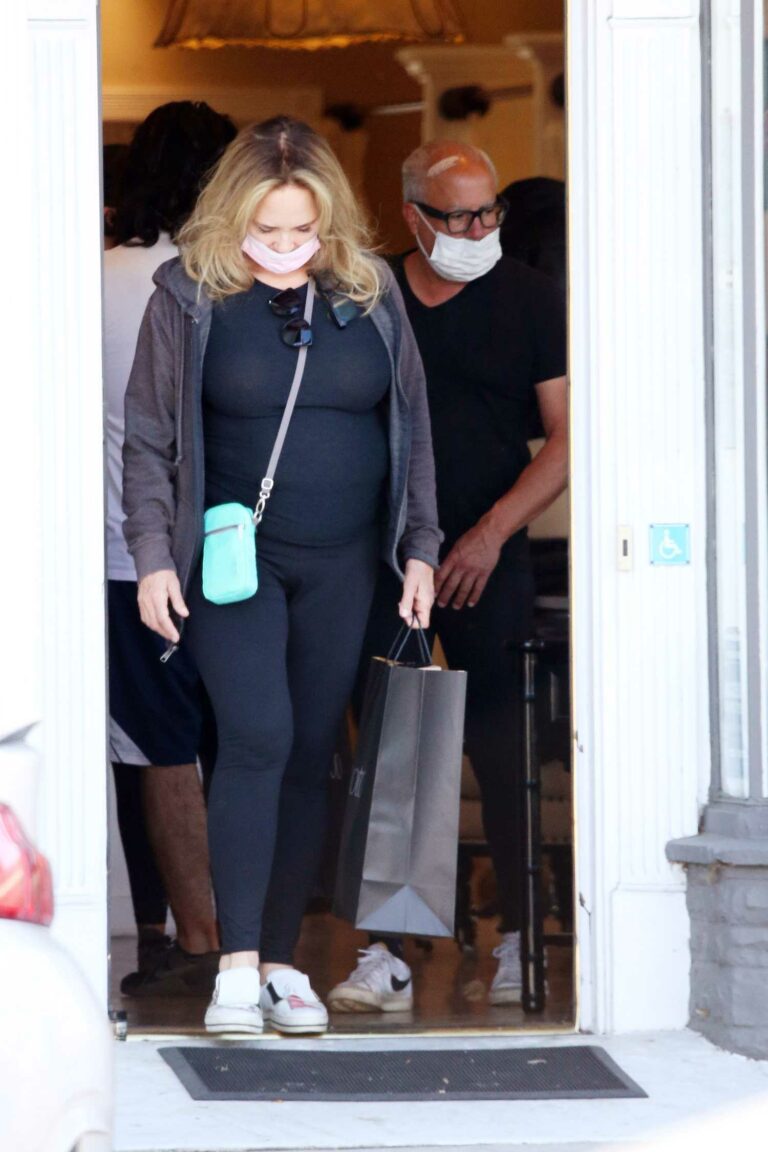 Catherine Bach in a Black Outfit Goes Shopping with Her Partner Peter