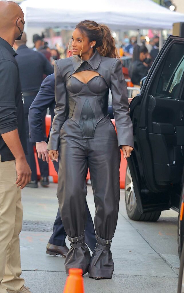 Ciara in a Grey Leather Jumpsuit